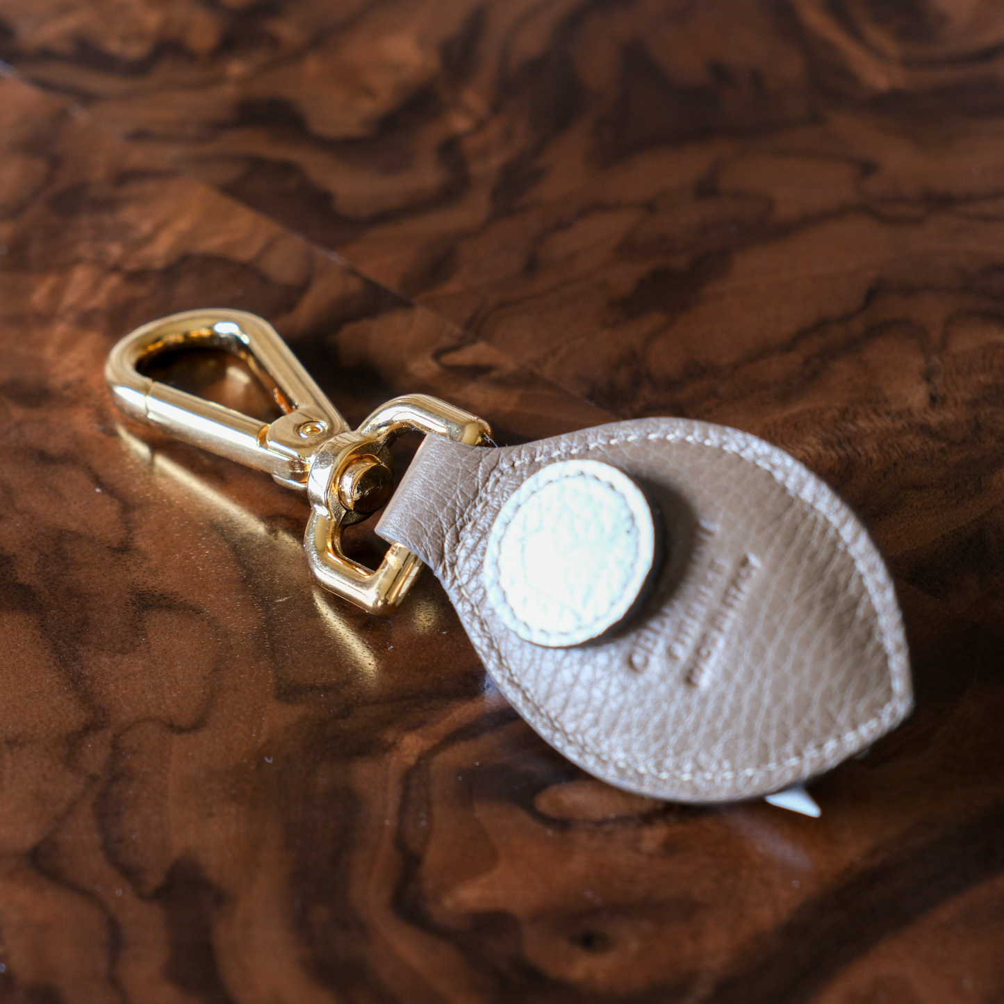 Leather tee holder by Cellerini, Florence